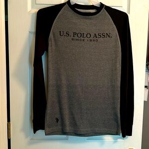 Men’s long sleeve polo shirt never worn.